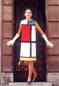 woman posing in mondrian dress in doorway